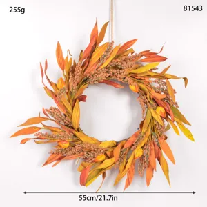 Autumn artificial flower wreath detail, realistic foliage and berries for wall decor.