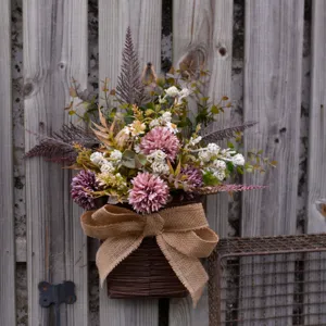 Artificial flower wall hanging detail, rustic wicker basket with burlap bow, home garden decor.