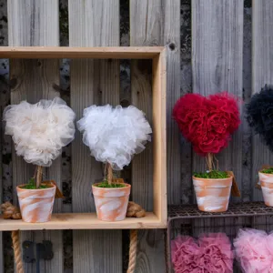 Heart-shaped tulle topiary potted plant, fabric heart tree decor for Valentine wedding home.