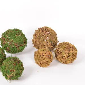 Handmade moss rattan balls detail, natural green decorative plant ornaments for garden floral.