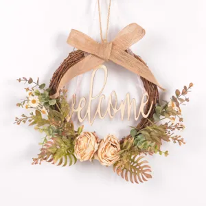 Detailed view of the autumn vintage artificial floral door wreath with welcome wooden sign.