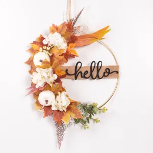 Autumn metal wreath wall hanging with artificial maple leaves, white pumpkins and hello sign decor.