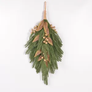 Norfolk pine needle and gold berry detail view for Christmas holiday wall decor hanging.