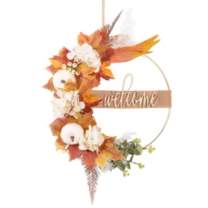 Autumn metal wreath front door decor with artificial maple leaves, white pumpkins and welcome sign.