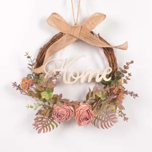 Autumn vintage artificial flower wreath with burlap bow and wooden Home sign for wall decor.