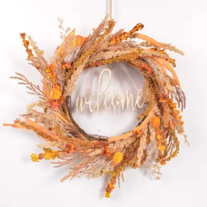 Autumn artificial plant wreath with welcome sign for front door Thanksgiving decoration detail.