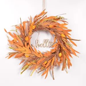 Autumn artificial wreath harvest festival front door hanging decoration with hello sign.