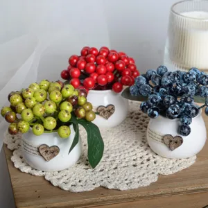 Artificial berry potted plants, mini fake flowers for office desk, home decor and photography.