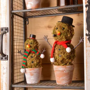 Handmade moss snowman potted ornament, rustic Christmas desktop decor with top hat and scarf.