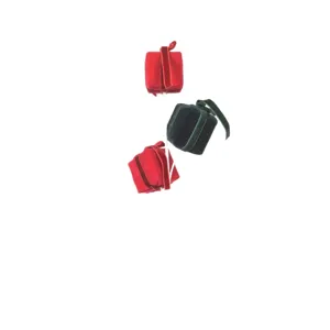 Close-up detail of Christmas velvet foam gift boxes with ribbon pendants for holiday decor.