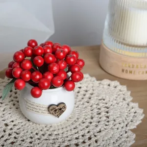 Mini potted artificial red berry plant for office desktop, auto, and home decor display.