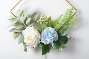 Nordic artificial flower wall hanging with gold geometric metal frame home decor detail