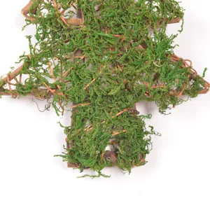 Detailed view of natural rattan moss Christmas tree hanging ornament, forest style wall decor.