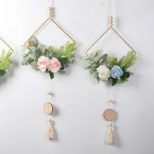 Nordic iron wall hanging with artificial roses and tassels, perfect for home decor and photography.