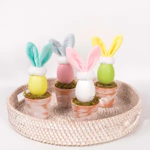 Easter egg bunny potted plants with cute plush ears and moss, ideal for holiday home decor.