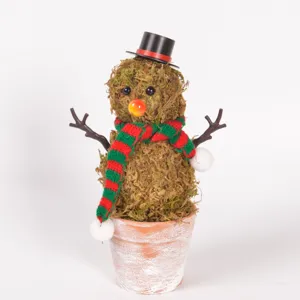 Handmade moss snowman potted ornament featuring a cute top hat and knitted scarf for holidays.