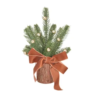 Mini Christmas tree desktop decor with velvet bow and gold bells, perfect holiday decoration.