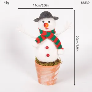 Mini Christmas snowman desktop ornament with cute flocking design, perfect holiday decor.