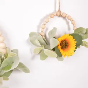 Sunflower wooden bead wreath detail close-up showcasing rustic farmhouse seasonal wall hanging decor.
