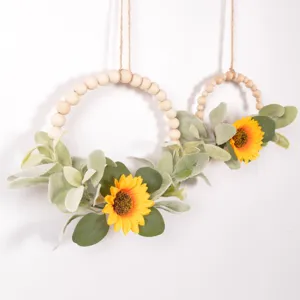 Artificial sunflower wooden bead wreath detail view, farmhouse home wall hanging decor