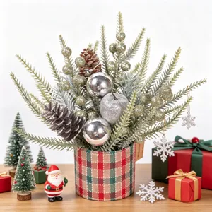 Christmas desktop decoration small potted plant with pine branches berries and glitter balls