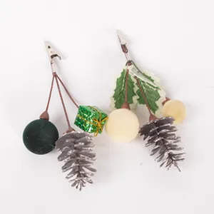 Christmas decorative clip with pine cones and berries for tree DIY floral arrangement detail