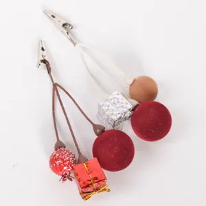 Christmas decorative clips with velvet balls and mini gift boxes for tree DIY decor.