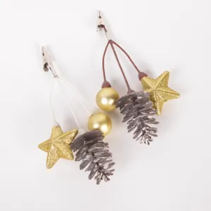 Christmas decorative clips with pinecones, glitter stars and golden balls for holiday gifts.