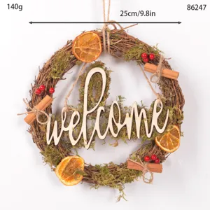 Christmas forest style wooden letter rattan wreath with dried orange slices and moss decoration.