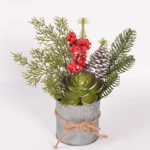 Christmas artificial succulent red berry potted plant detail, metal bucket floral ornament.