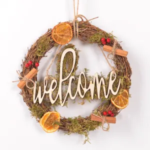 Christmas forest style wooden letter rattan wreath with dried orange slices and moss door hanging.