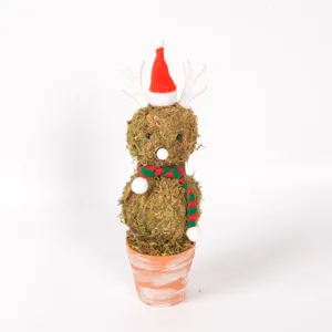 Detailed shot of Christmas moss elk potted figurine with mini Santa hat and retro flower pot.