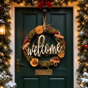Christmas rustic wooden letter rattan wreath with dried orange slices and moss for front door.