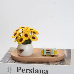 Mini sunflower potted plant and cute camper car ornament set for home office desktop decor.