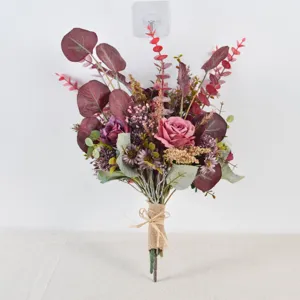 Detailed close-up of vintage artificial flower bouquet, autumn colors decoration.