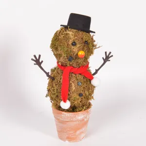 Handmade moss snowman detail shot, rustic potted plant ornament for Christmas desktop decor.