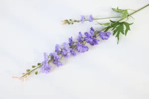 Artificial purple delphinium flower stem faux plant for wedding home decor floral arrangement.