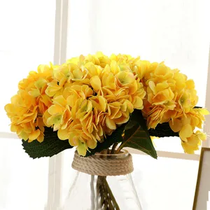Artificial hydrangea flower bouquet detail, yellow floral decor for home and wedding arch.