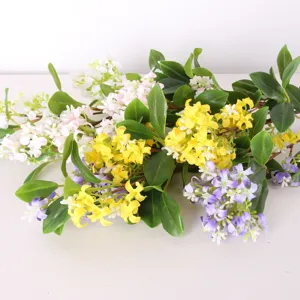 Artificial flower branch detail close-up, colorful silk osmanthus decor for home