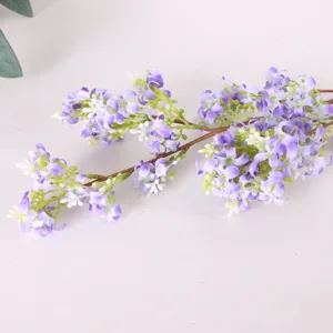 Close-up view of purple artificial osmanthus flower branch for home decor and floral arrangements.
