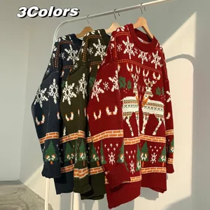 Chic Christmas knitted sweater featuring classic reindeer and snowflake patterns, cozy loose fit.