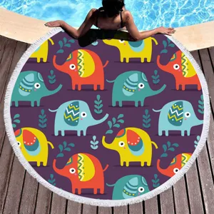 Round microfiber beach towel featuring a colorful cartoon elephant print and stylish fringe trim.