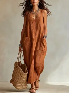 Detail shot of casual brown cotton linen sleeveless strap jumpsuit with large pockets.