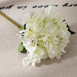 Detailed view of white artificial hydrangea flower, perfect for home and wedding decor.