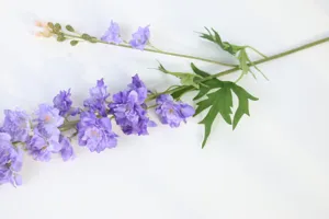 Detailed view of the artificial purple delphinium flower stem, perfect for floral decoration.