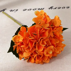 Artificial orange hydrangea flower for home wedding decoration, realistic silk floral props.