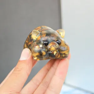 Handmade crystal chip resin cute pig figurine, perfect for car dashboard or home decor detail.