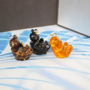 Close-up detail of resin turtle figurines, creative desktop decoration scene setup.