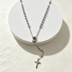 Stainless steel long beaded necklace detail, featuring 6mm steel beads and a vintage cross pendant.