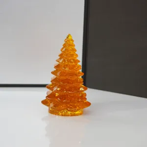 Amber resin Christmas tree figurine detail, perfect holiday decor for office desktop and car.